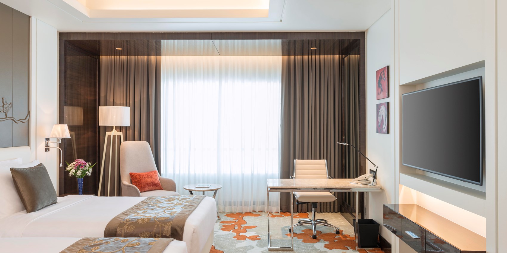 radissonbluajman-guestroom-twin.jpg